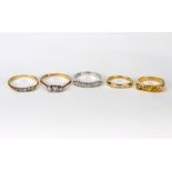 Five gold and gem set rings, comprising; a graduated old-cut diamond three stone ring,