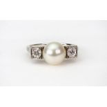 A mid 20th century cultured-pearl and diamond three stone ring,