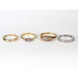 Four various rings, comprising; an early 20th century 18ct gold and diamond five stone ring,