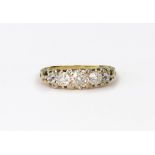 A Victorian gold and diamond five stone ring with rose diamond points,