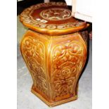 A Victorian brown glazed jardiniere, of bulbous hexagonal form, 52cm high.