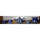 A Wedgwood blue Jasperware matched tea set comprising; a teapot, a milk jug, a cream jug,