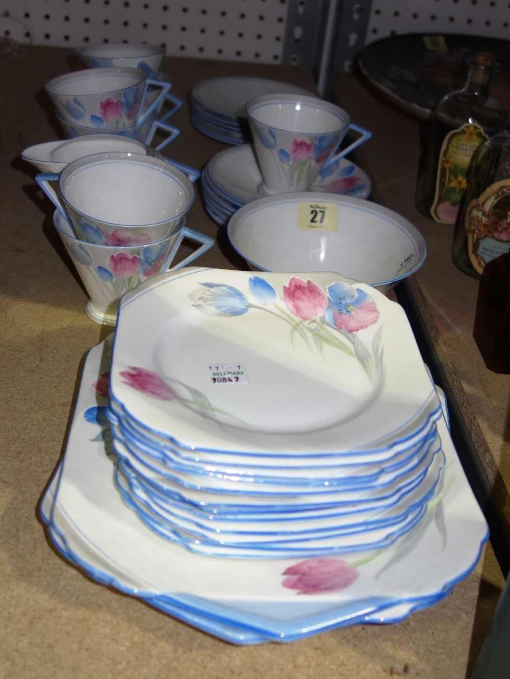 A Shelley Mode Shape part tea service decorated with pink and blue flowers, (qty).