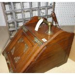 A Victorian brass coal scuttle and a brass framed fire screen, (2).