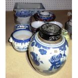 Oriental ceramics including; a blue and white jar with pierced hardwood cover,
