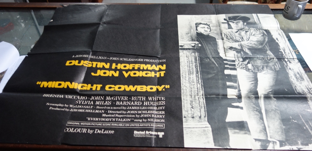 A mid 20th century film poster for Midnight Cowboy.