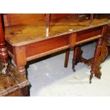 A 19th century mahogany rectangular side table with galleried back and turned tapering legs,