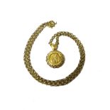 A 9ct gold St Christopher pendant, decorated with a pierced border,