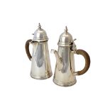 A silver two piece cafe au lait set, comprising; a coffee pot and a hot milk jug,