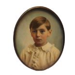 An early 20th century Swedish school over-painted portrait miniature of a young boy,