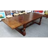 A 17th century style oak extending refectory table,