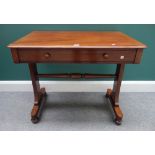An early Victorian mahogany single drawer writing table on trestle end standards,
