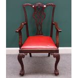 An 18th century style mahogany carver chair with pierced splat on ball and claw feet,