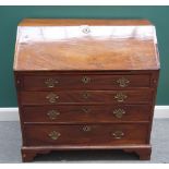 A George III mahogany bureau, the fitted interior over four long graduated drawers, on bracket feet,