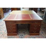 An early 20th century mahogany pedestal desk of 18th century design,