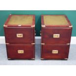 A pair of brass bound campaign style mahogany two drawer bedside tables, with inset leather tops,