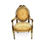 After George Jacob; a 19th century cream and parcel gilt oval back open armchair,