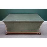 A Victorian sarcophagus shaped lift-top ottoman on mahogany knurl feet, 110cm wide x 46cm high.