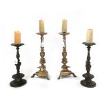 A pair of bronze altar candle sticks, 18th century,