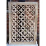 A 20th century Indian pierced and carved Jali screen, 163cm x 107cm.