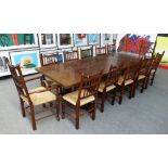 A set of twelve Lancashire style bobbin turned oak and ash rush seated dining chairs,