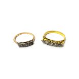 A gold and diamond set five stone ring,
