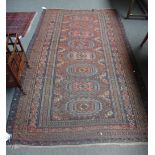 A Soumac carpet, Caucasian, the flat weave madder field with eight medallions, minor motifs,