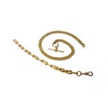 A gold faceted curb link neckchain with a boltring clasp,