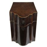 A George III inlaid mahogany slope top serpentine fronted knife box with fitted interior,