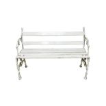 A Victorian white painted cast iron garden bench,