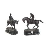 A modern patinated bronze figure of a mounted jockey,