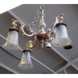 A pair of silvered metal four branch chandeliers, modern,