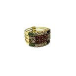 A gold, ruby, sapphire, emerald and colourless gem set ring, in a four section multiple hoop design,