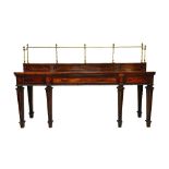 A mahogany serving table of George III design,