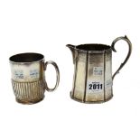 Silver, comprising; a Victorian milk jug, of tapering form, with a scrolling handle,