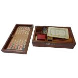 A mahogany cased games compendium by Asser & Sherwin, early 20th century, containing; solitaire,