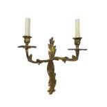 A set of four Louis XVI style brass two branch wall lights, 20th century,
