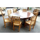 A set of eight light oak Lancashire style wavy ladder back dining chairs,