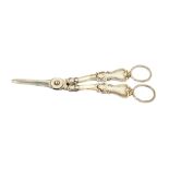 A pair of Victorian silver grape scissors, having cast decoration, Birmingham 1846,