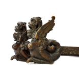 A pair of 18th century Italian carved walnut lopers/bureau pulls,