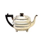A George III silver teapot, of shaped rectangular form,