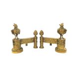 A pair of French Louis XVI style ormolu chenets, early 20th century,