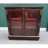 A Victorian gilt metal mounted marquetry inlaid ebonised glazed two door side cabinet,