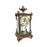 An Ansonia four glass mantel clock, early 20th century,