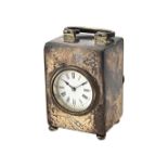 A late Victorian silver rectangular cased carriage clock timepiece, with a French movement,