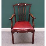 An 18th century style mahogany framed carver chair with carved and pierced splat,
