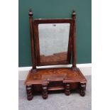 A Williams IV inlaid mahogany toilet mirror, the inverted breakfront base with seven secret drawers,