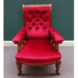 A Victorian oak Gothic Revival inlaid open armchair on turned supports, 75cm wide x 100cm high.