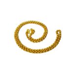 An Oriental gold neckchain, in a circular link design, on a serpentine clasp, detailed 9999,