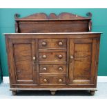 A George III figured oak side cabinet,